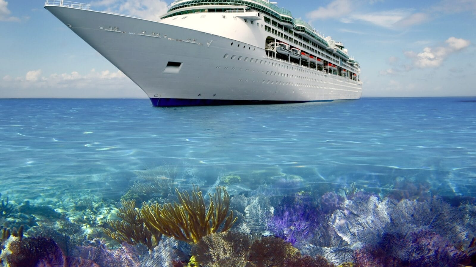 Cruise ship in front of a reef.