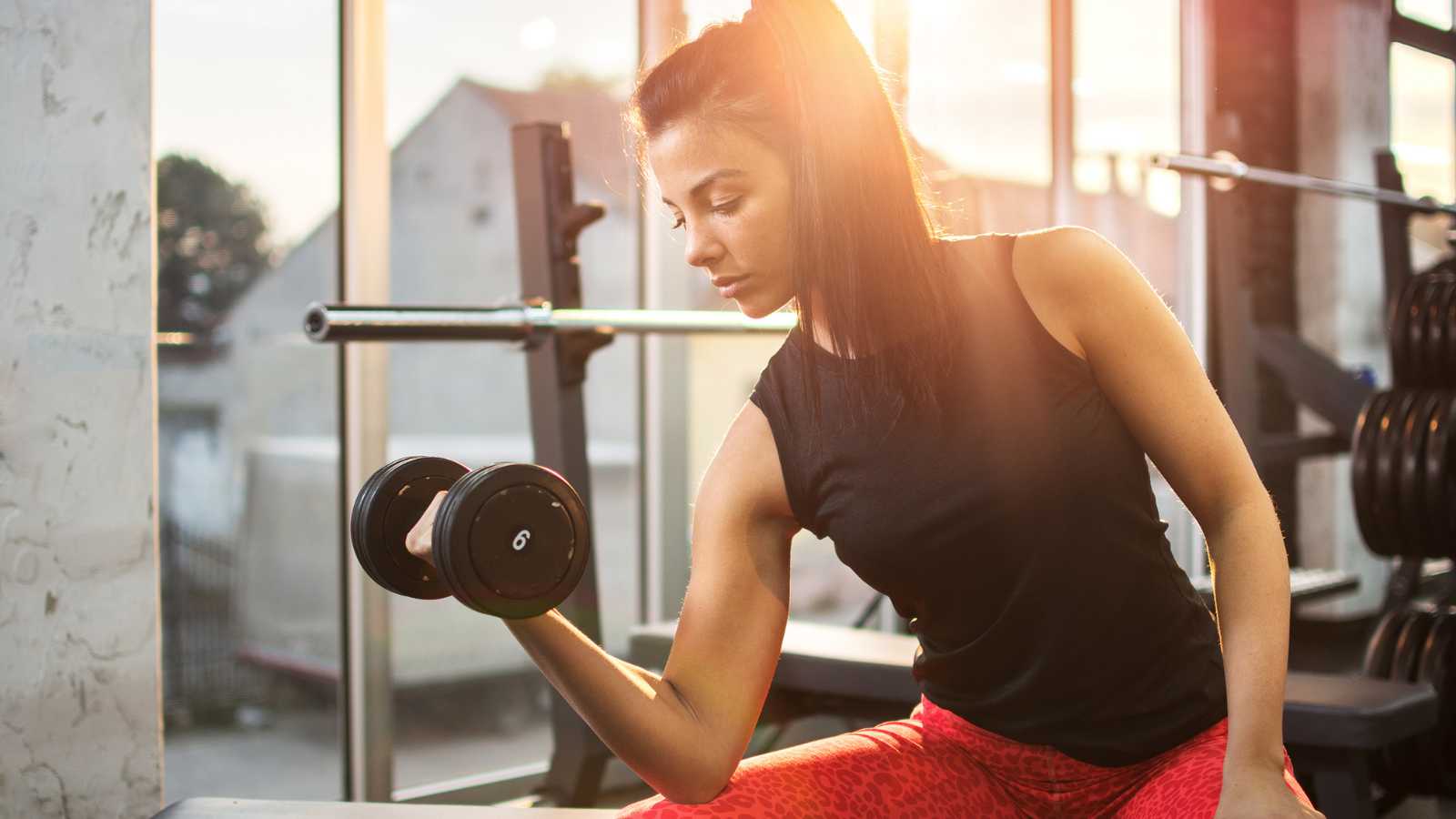 Woman lifting weights.