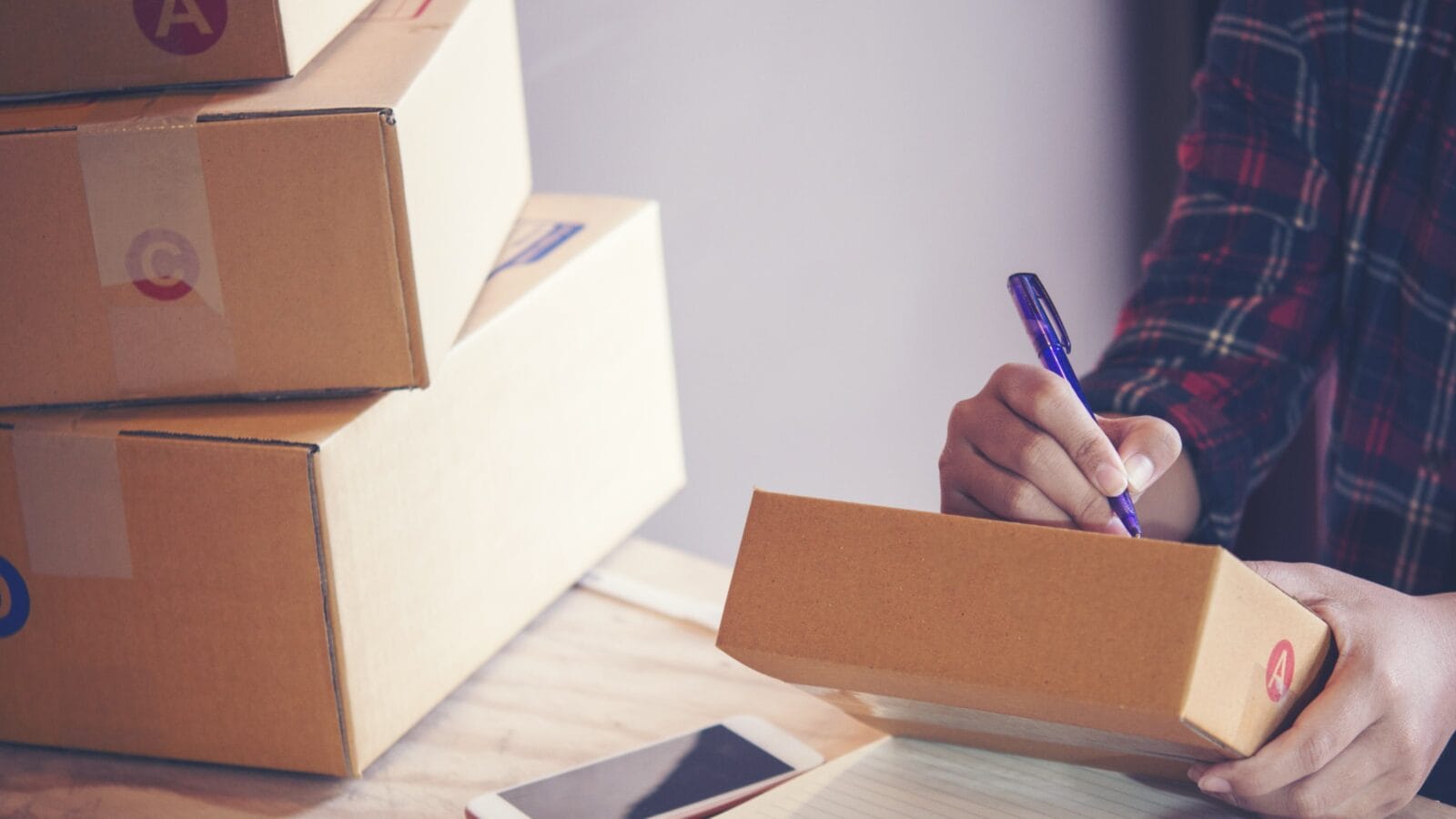 Person with a stack of boxes