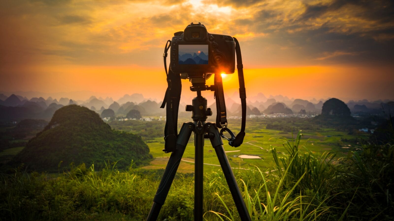 Camera on a tripod at sunset