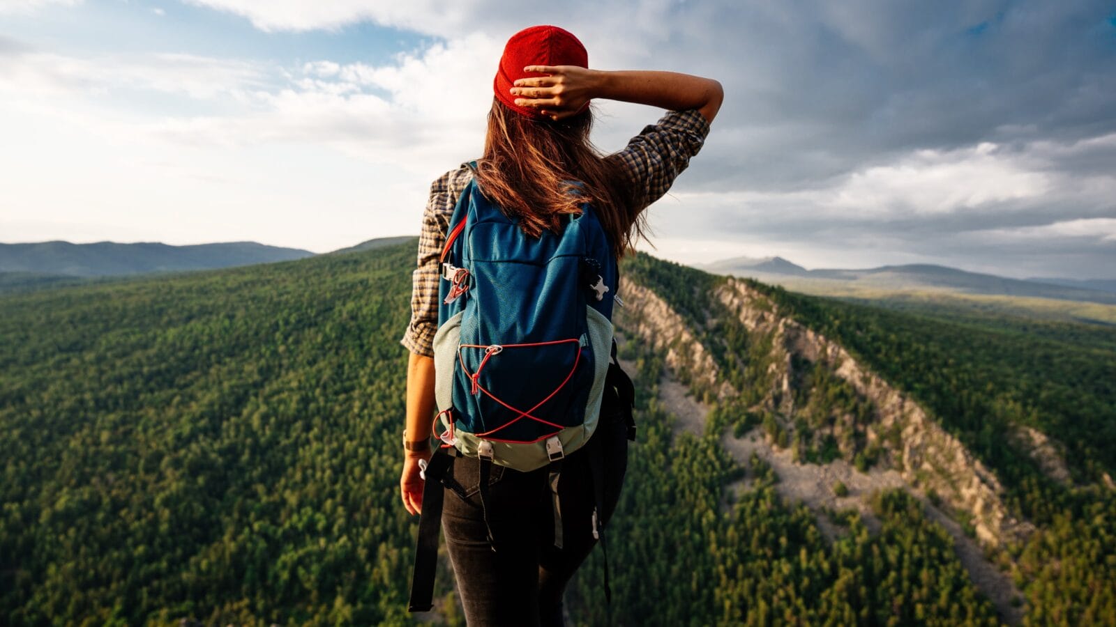 A hiker looking at a mountain.