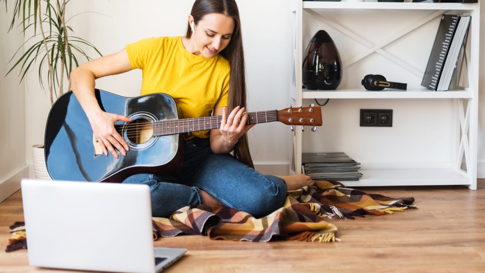 Woman playing a Guitar