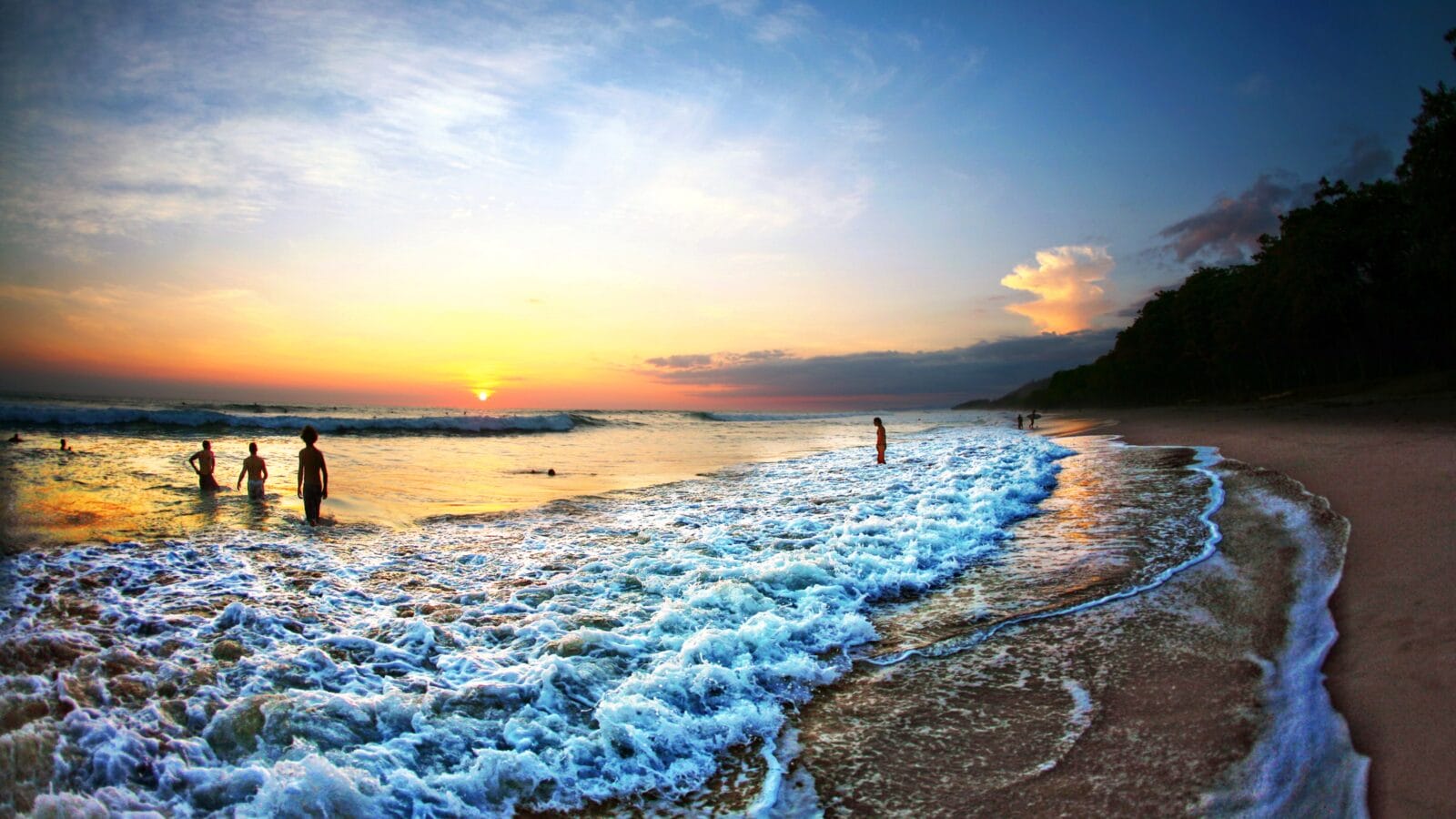 People swimming in the ocean in Costa Rica