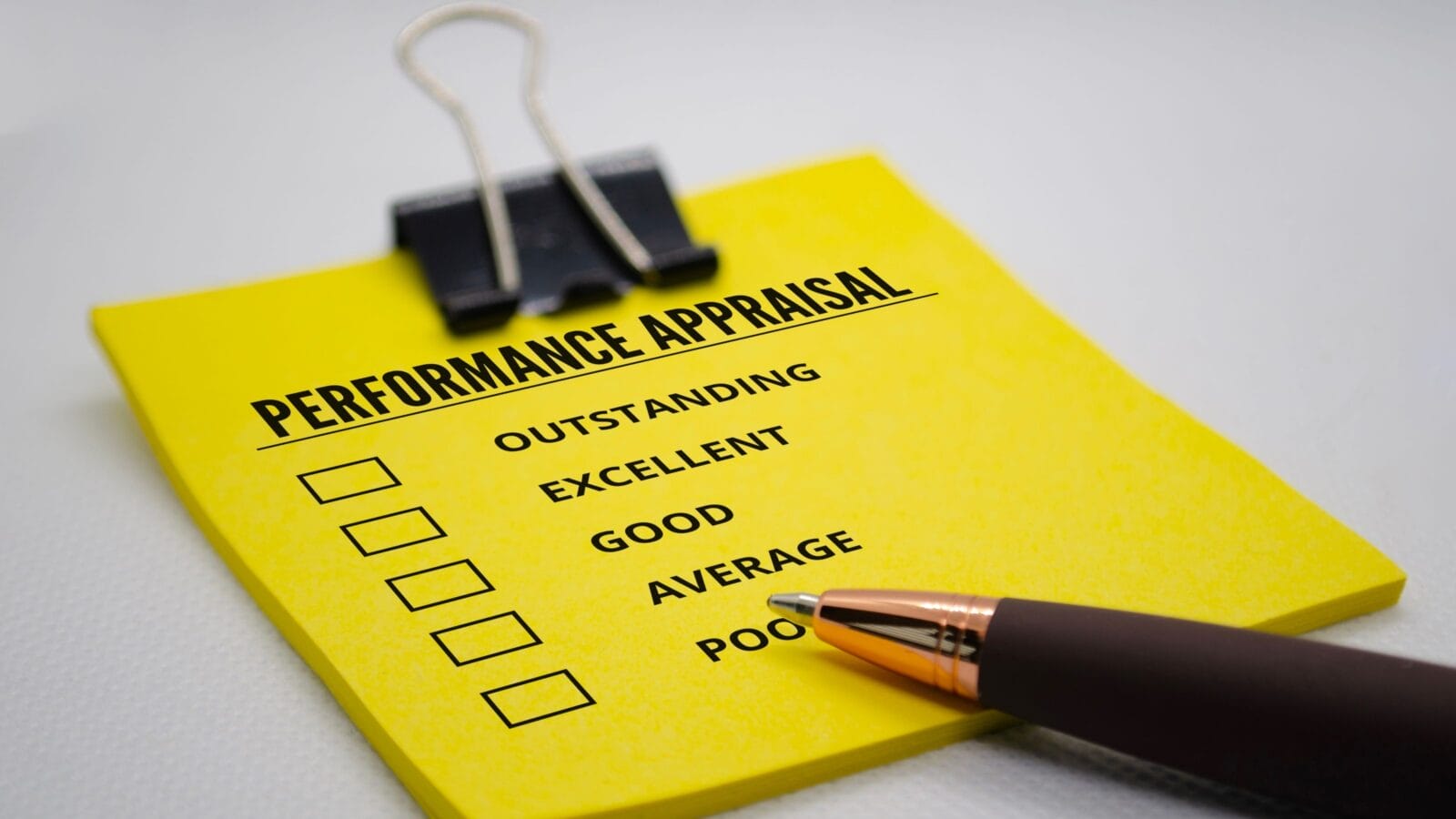 Performance appraisal text on sticky notes