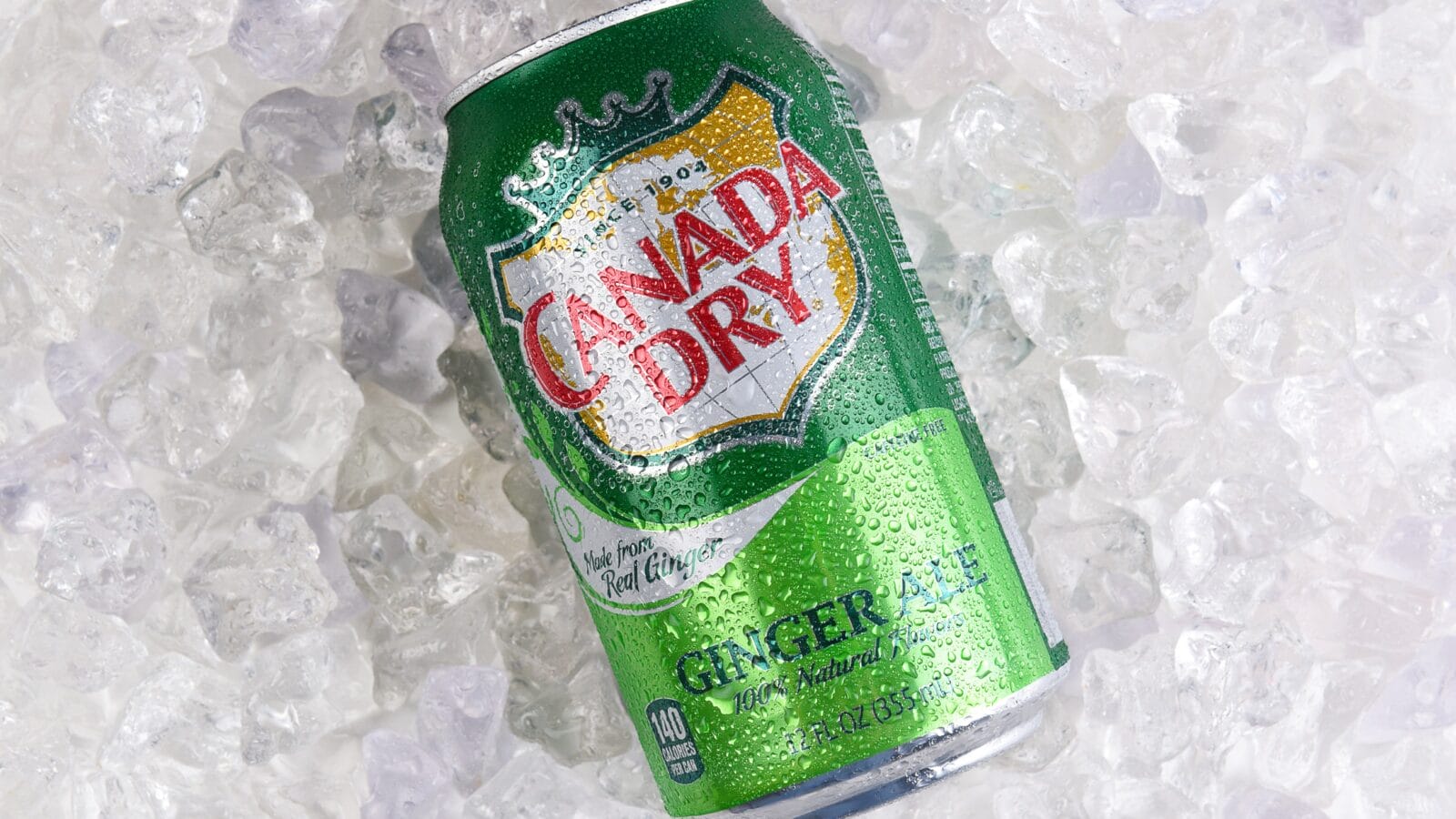 A can of Canada Dry Ginger Ale on ice.