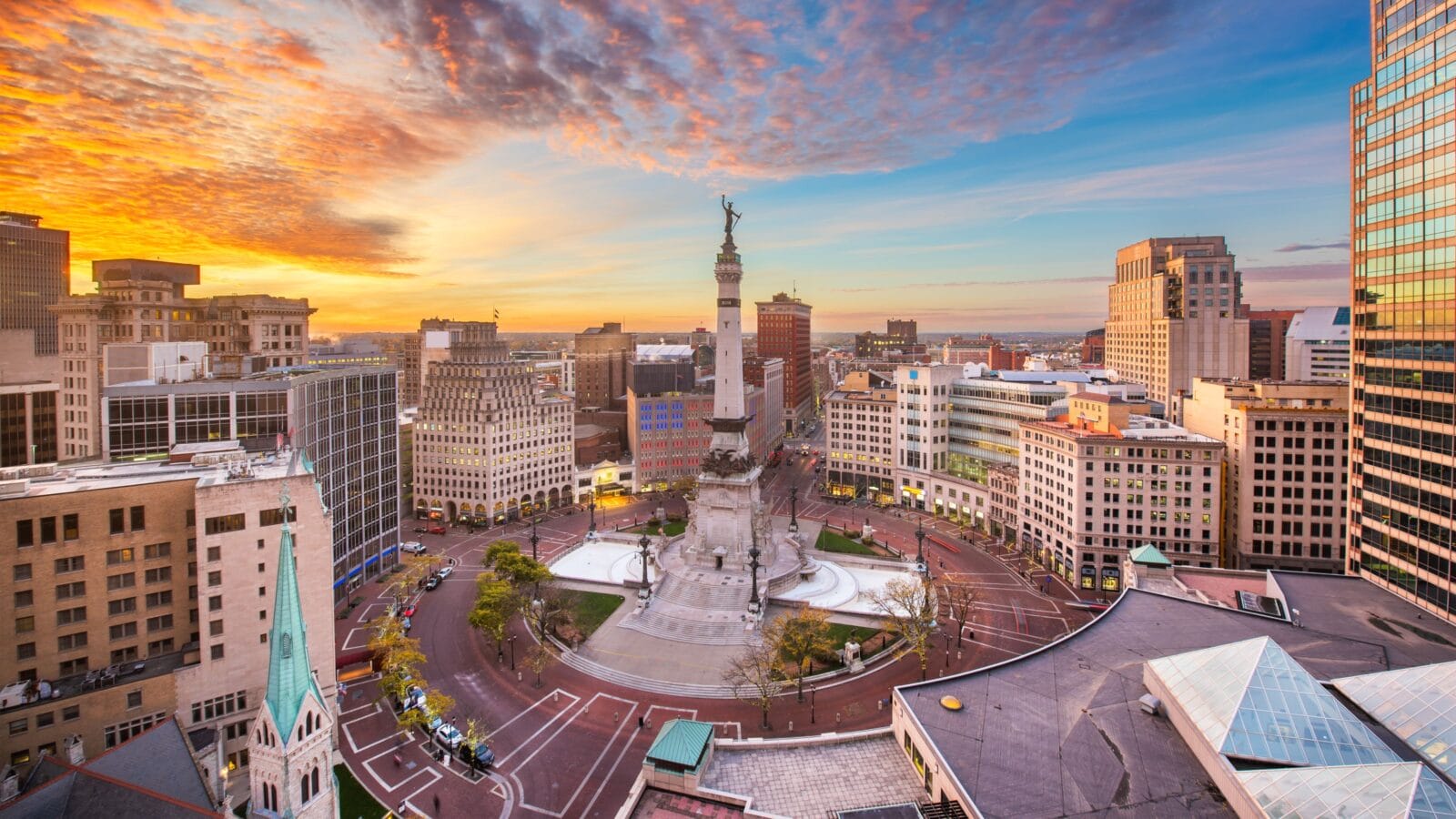 Indianapolis, Indiana, USA skyline over Soliders' and Sailors' Monument at dusk.
