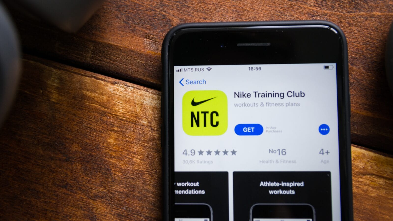 Smartphone with mobile application Nike Training Club