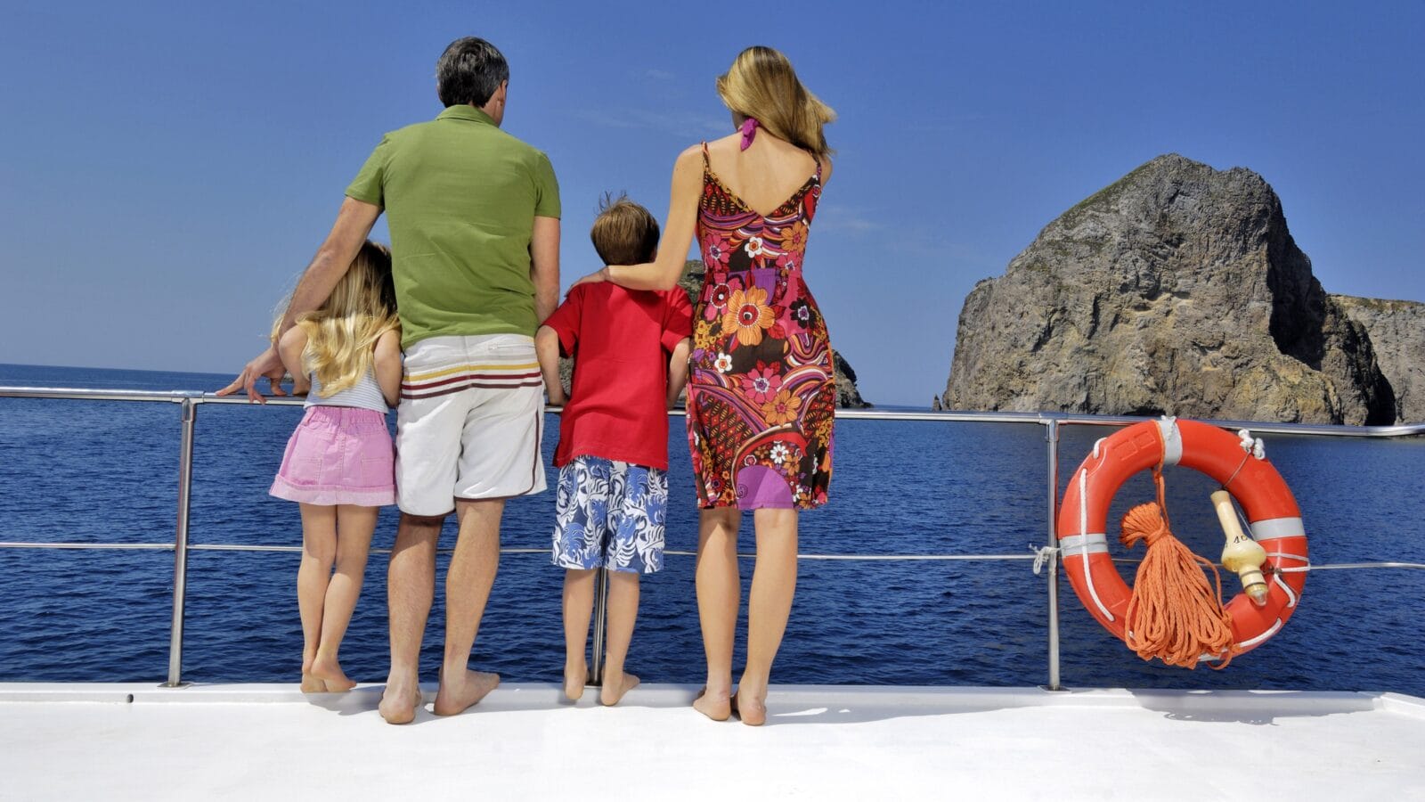 Family looking outside from a boat.
