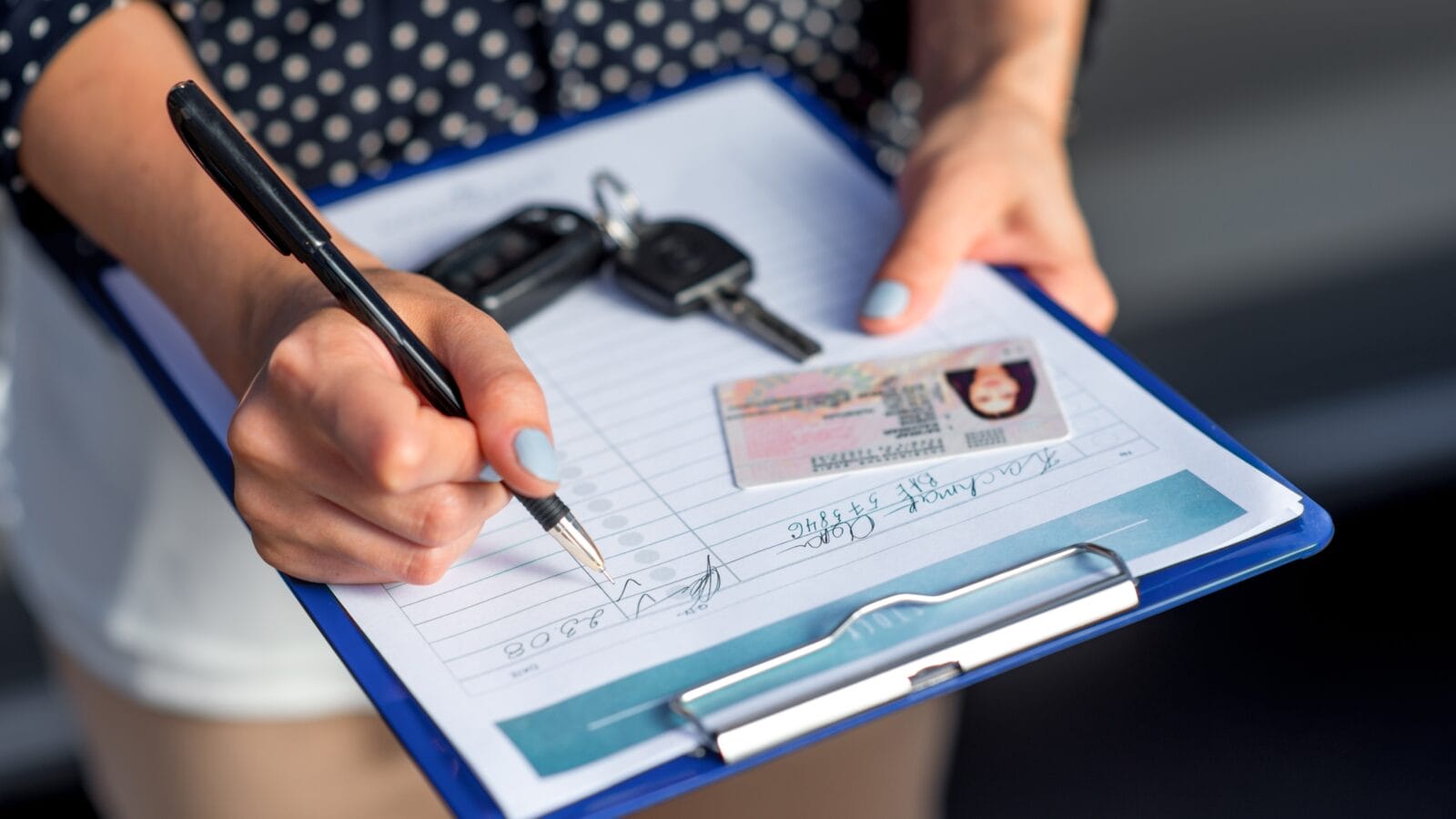 A woman filling contract for renting.