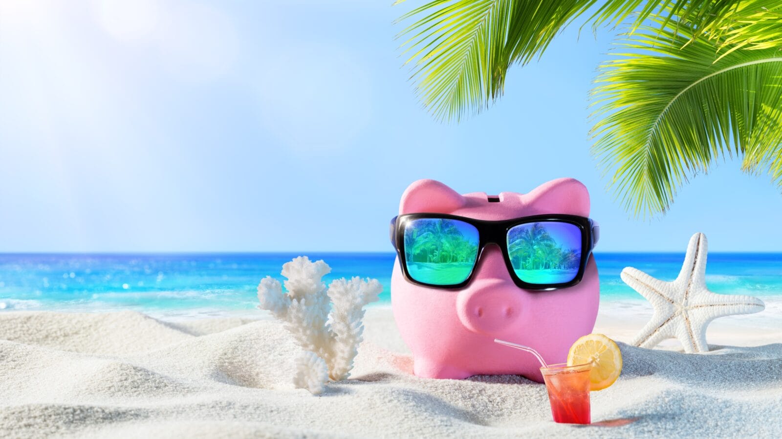 Piggy Bank With Drink On The Palm Beach.