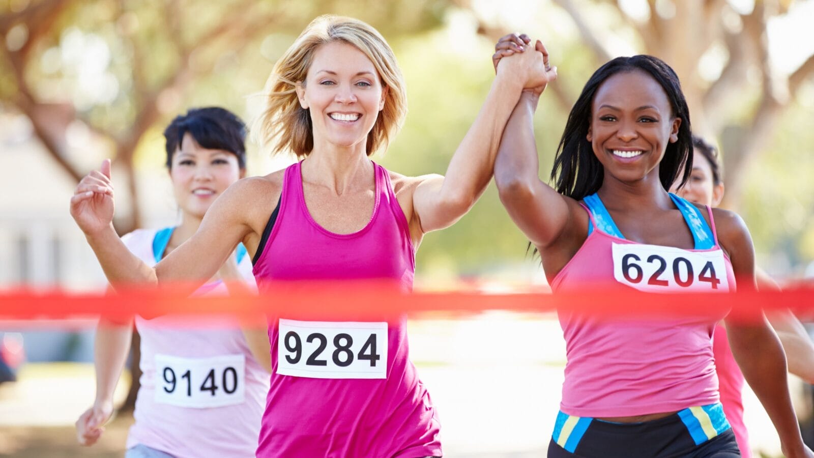 Two Female Runners Finishing Race Together