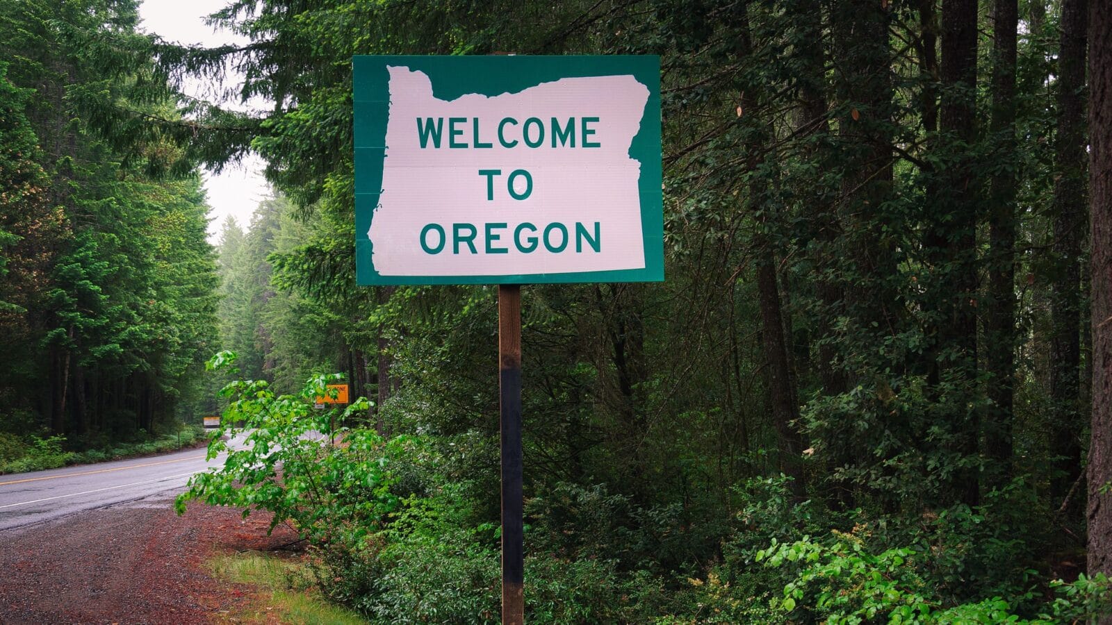 Welcome to Oregon State Sign on US-199 also called the Redwood Highway