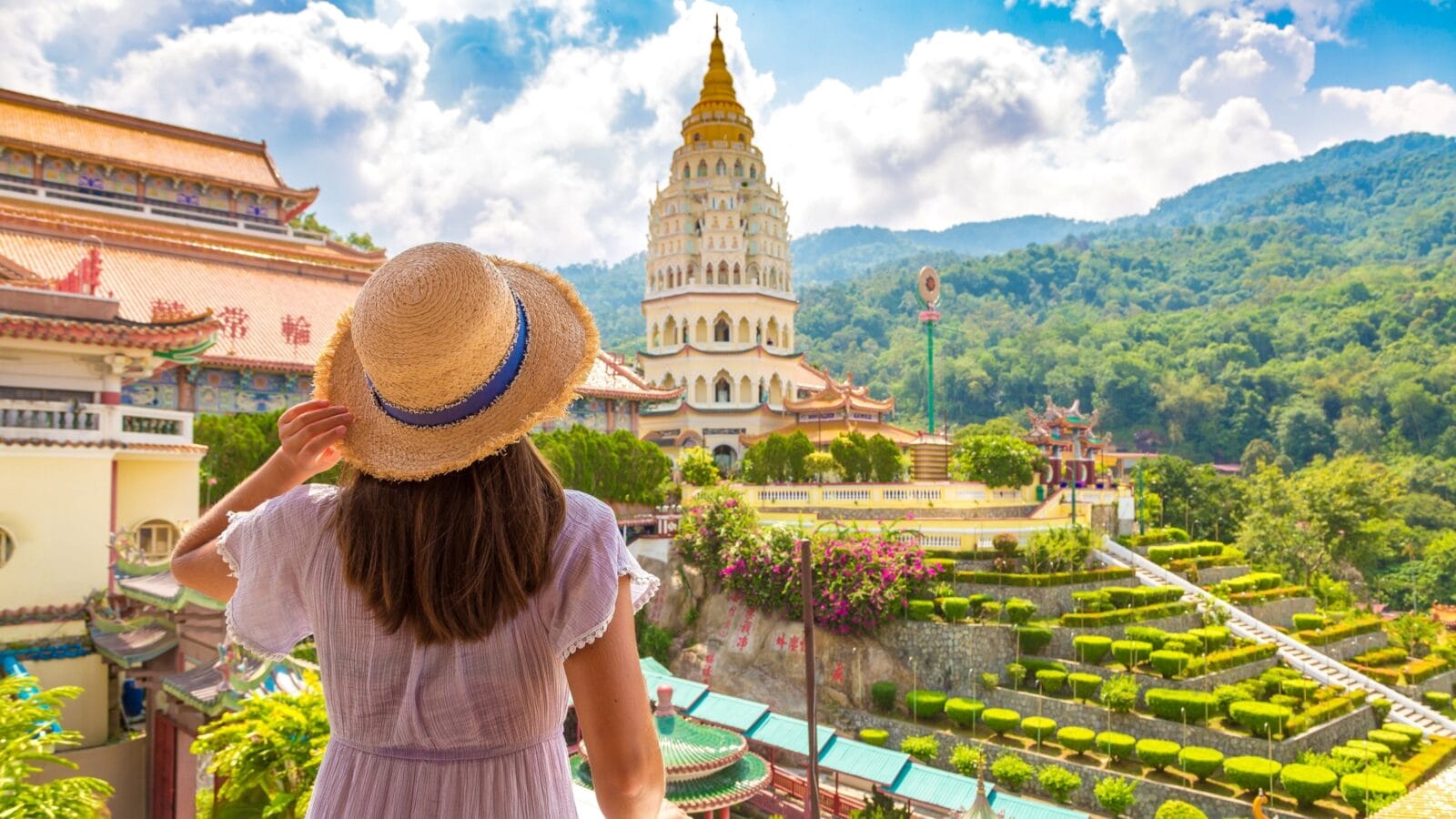Woman traveler at Kek Lok Si Temple in Georgetown, Penang island, Malaysia