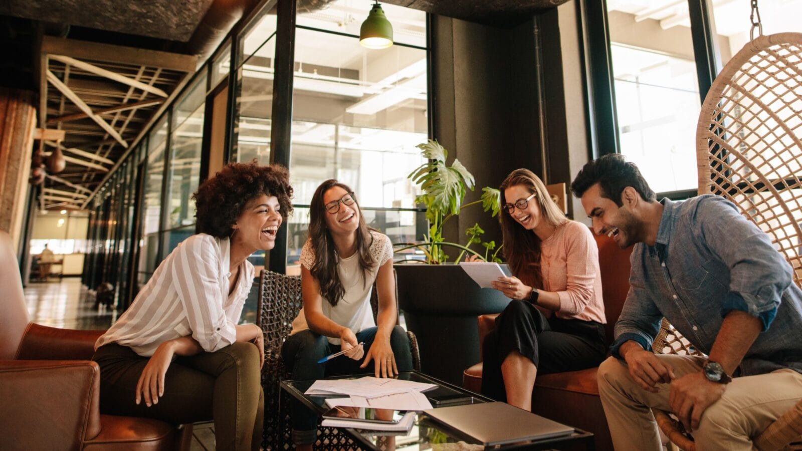 Business team working on new project and smiling