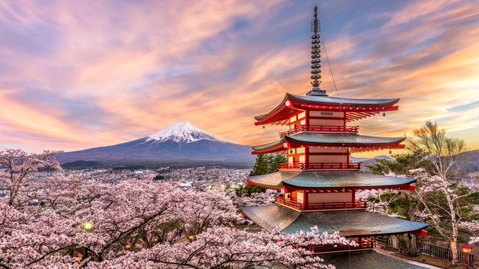 Fujiyoshida, Japan at Chureito Pagoda and Mt. Fuji in the spring with cherry blossoms