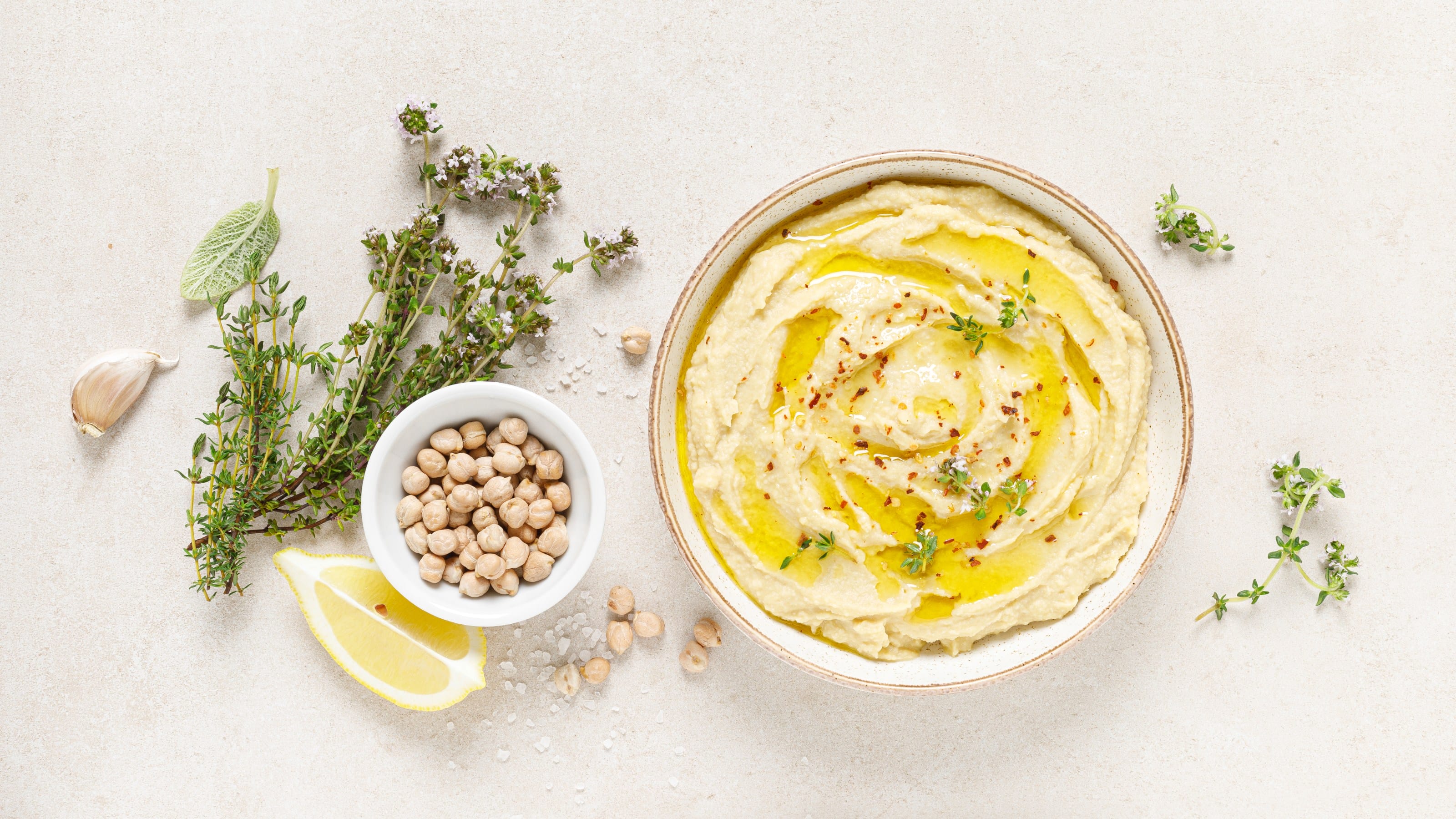 Hummus, mashed chickpeas with lemon, spices and herbs