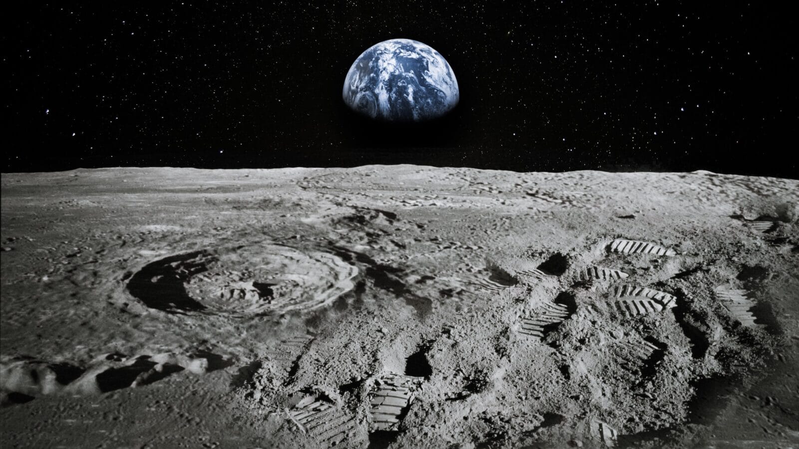 View of Moon limb with Earth rising on the horizon.