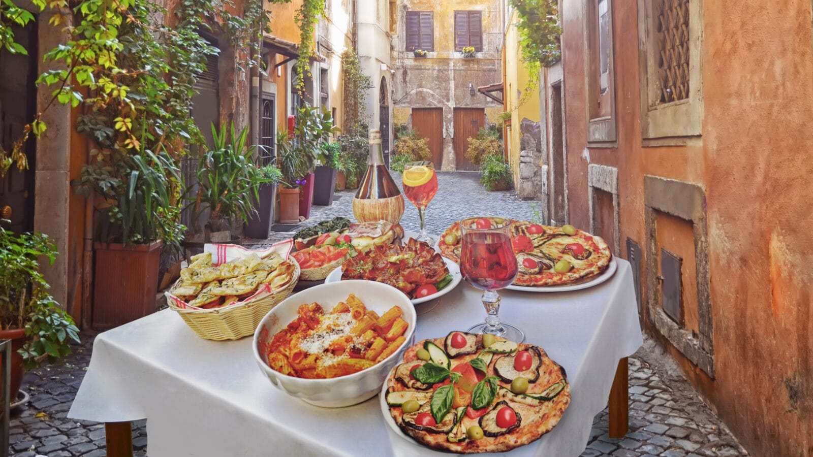 Pasta , pizza and homemade food arrangement in a restaurant Rome