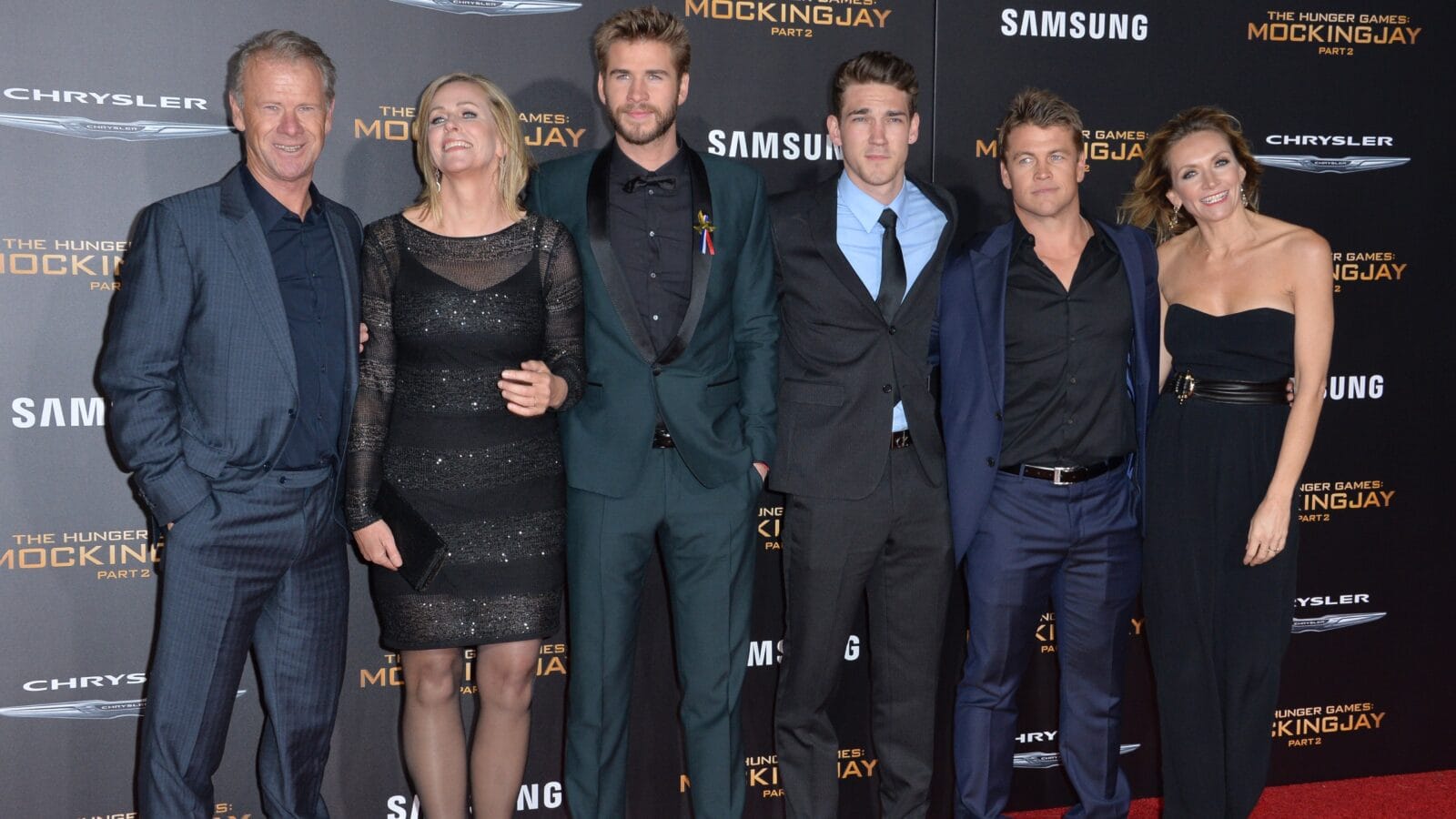 Actors Liam Hemsworth (3rd from left), Luke Hemsworth (2nd from right) & parents & family at the premiere of Liam's movie "The Hunger Games: Mockingjay - Part 2"
