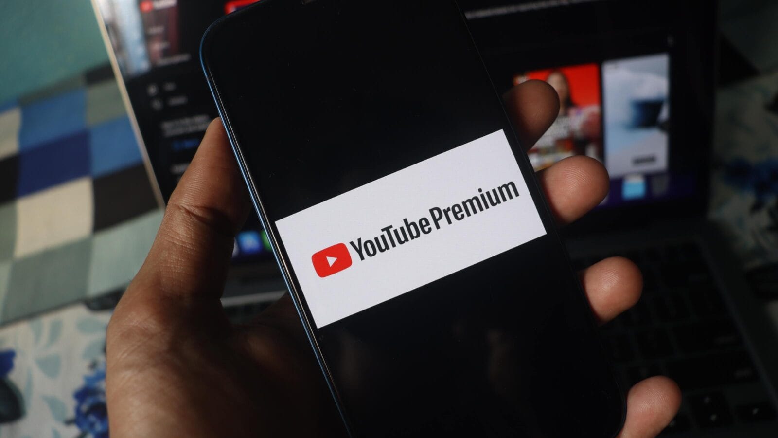 YouTube Premium on iPhone screen.