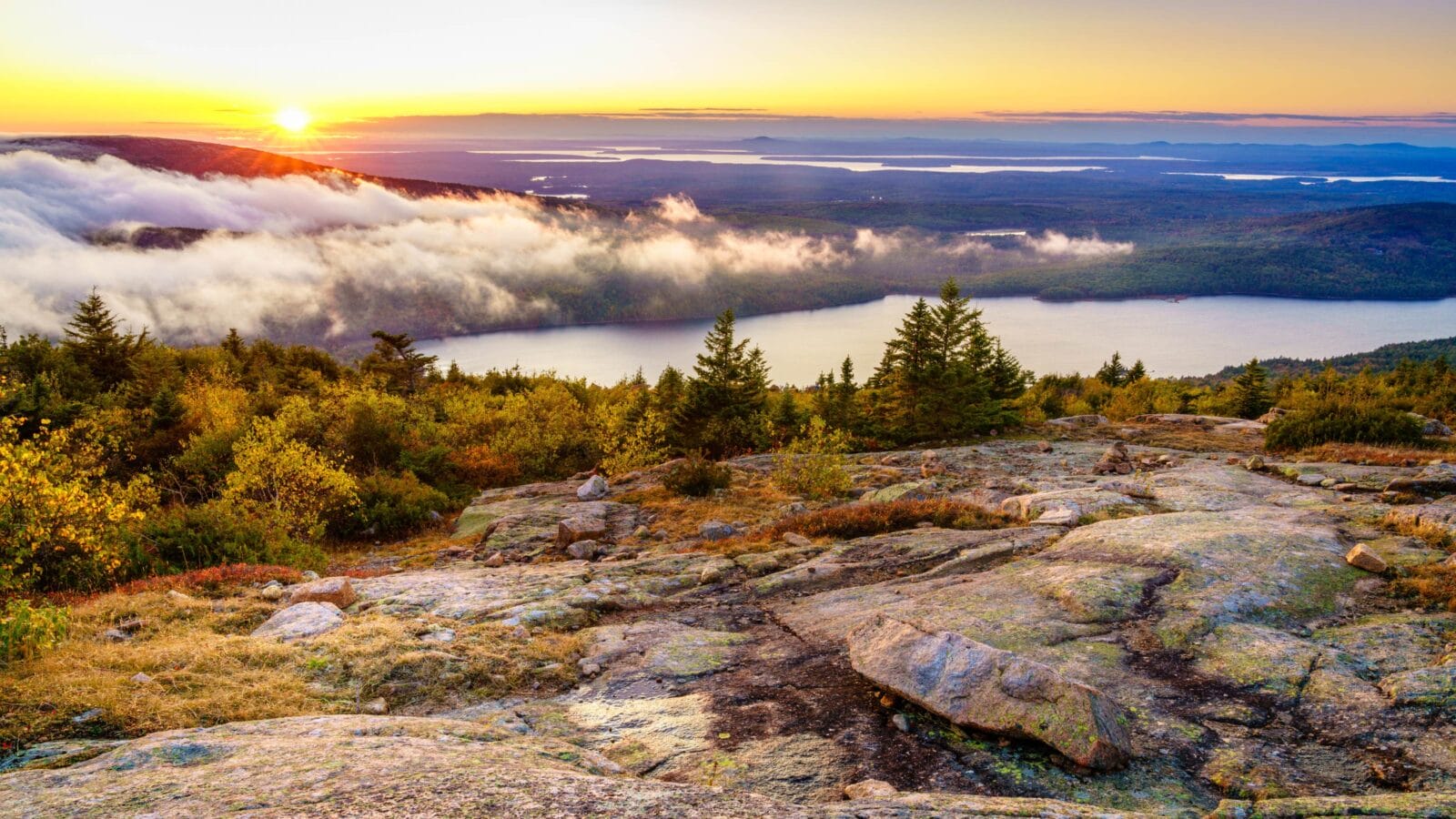 Scenic sunset in Acadia National Park as seen from the top of Cadillac Mountain