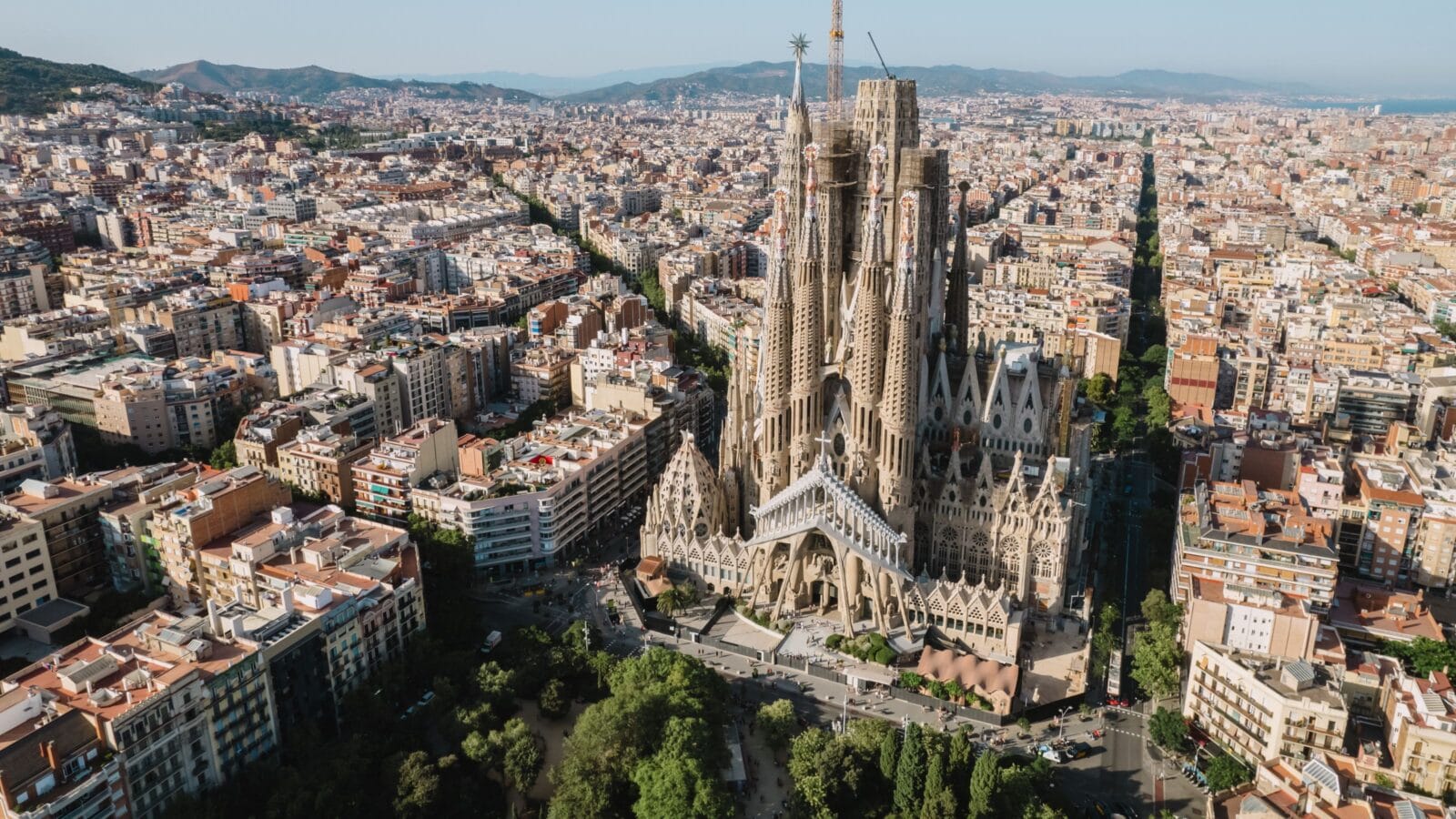 Aerial view shot of La Sagrada Familia Basilica Barcelona at sunrise.