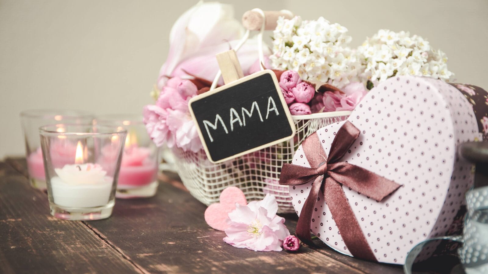 A nice gift basket with candles and a box for Mother's Day