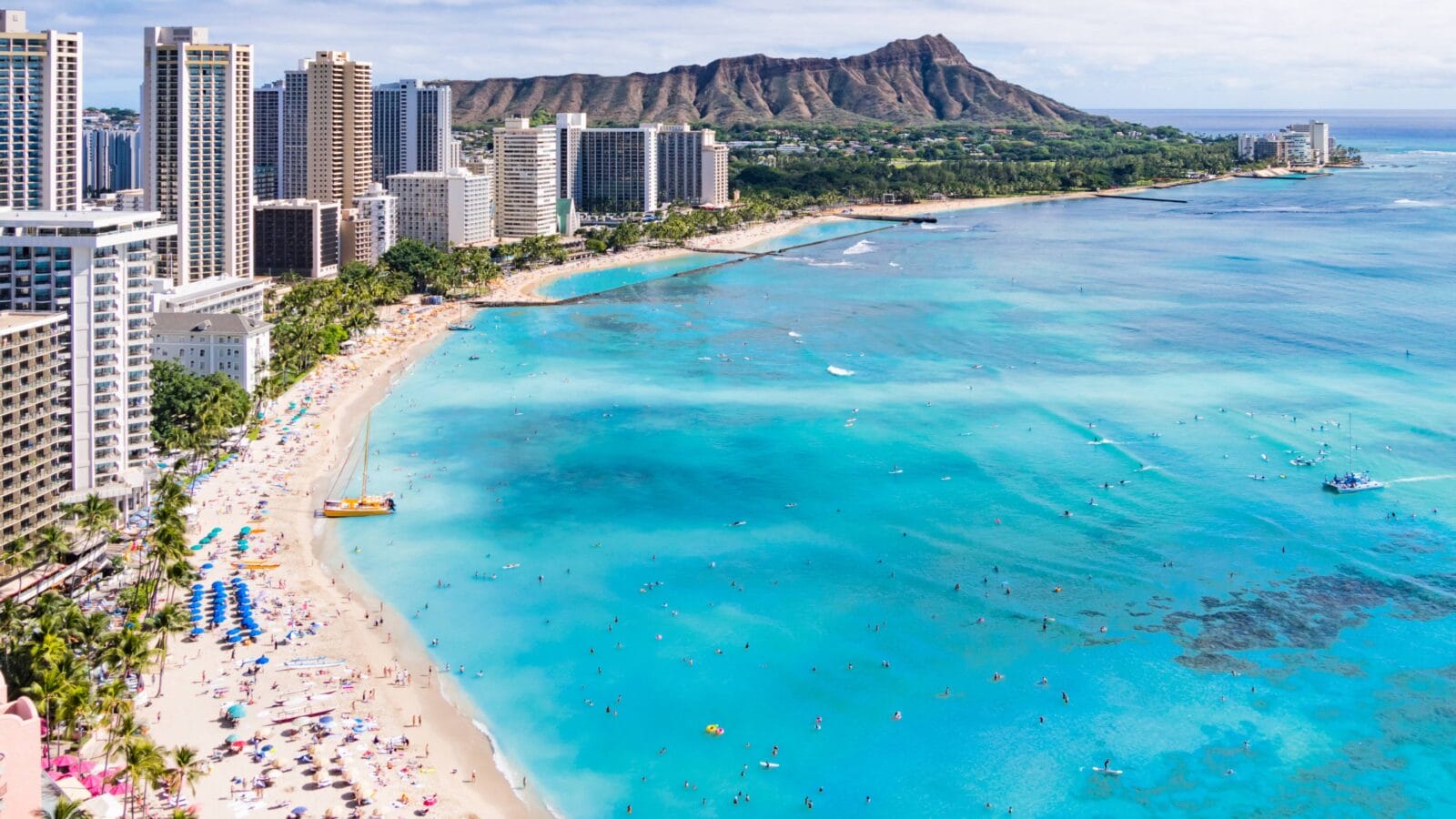 Waikiki Beach and Diamond Head Crater including the hotels and buildings in Waikiki, Honolulu, Oahu island, Hawaii.