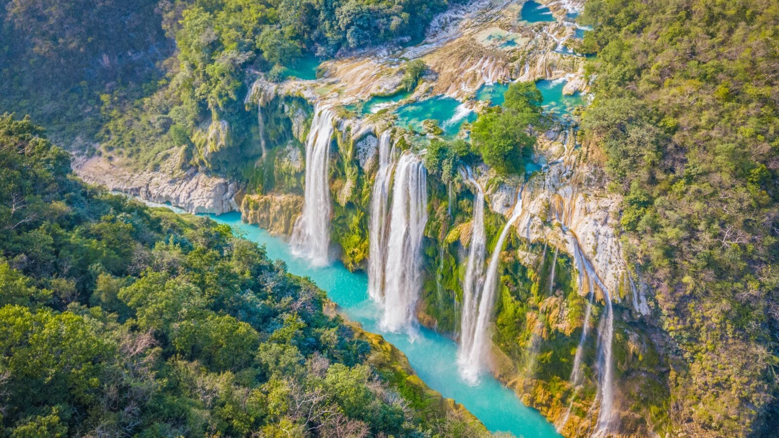 Amazing crystalline blue water of Tamul waterfall at Huasteca Potosina in San Luis Potosi, Mexico
