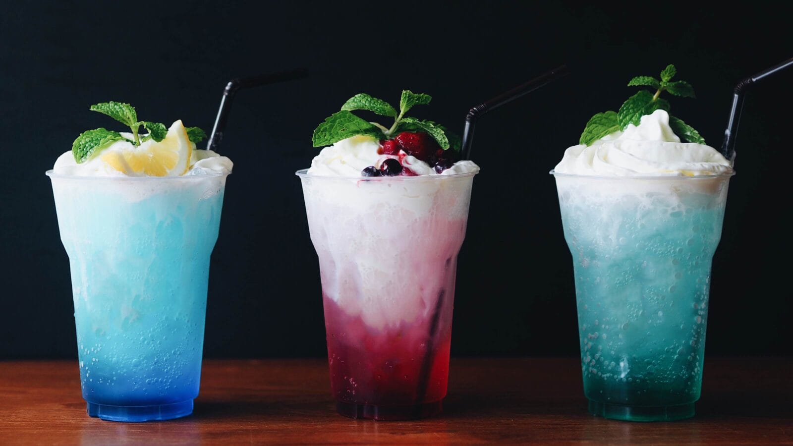 Close up Italian cream soda over dark background.