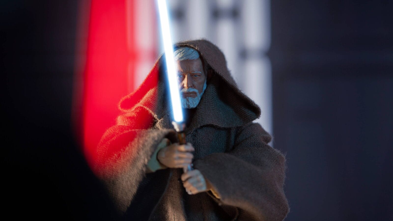 Scene from Star Wars A New Hope when Sith Lord Darth Vader strikes down Jedi Obi-Wan Kenobi - customized Hasbro action figure