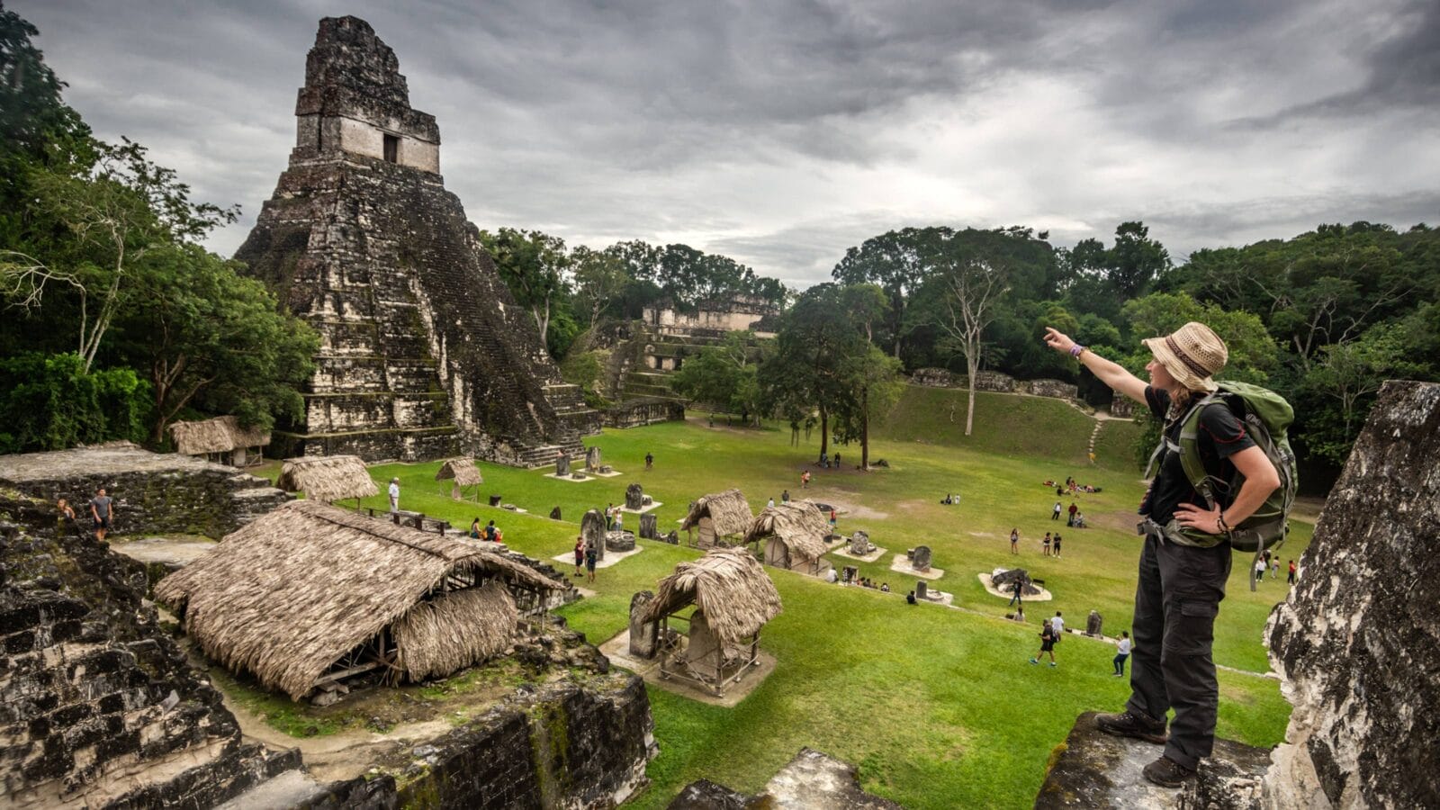 Famous Tikal pyramid with standing tourist woman, Guatemala, Central America