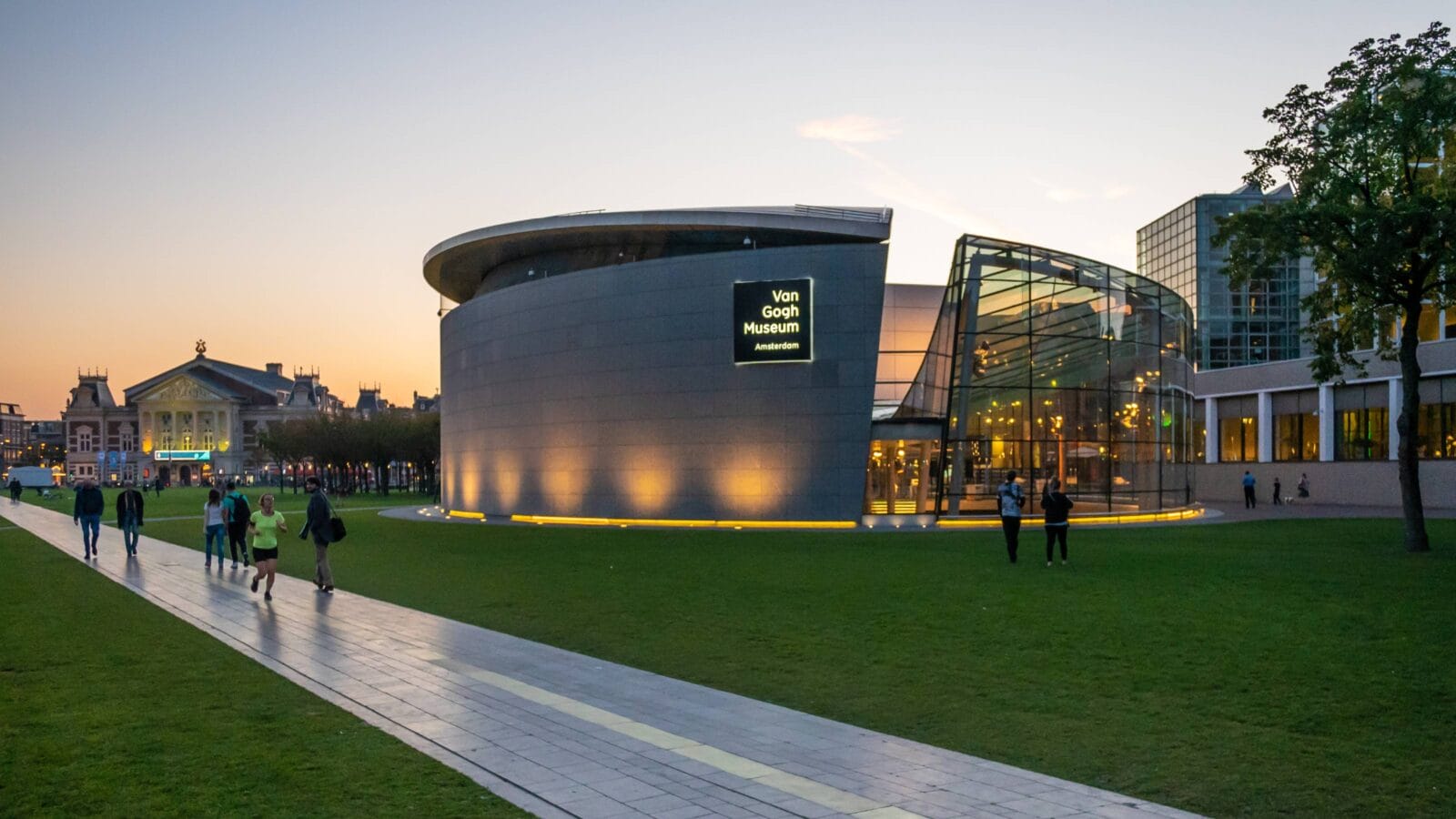 The outside of the Van Gogh Museum from Museumplein during the early evening.